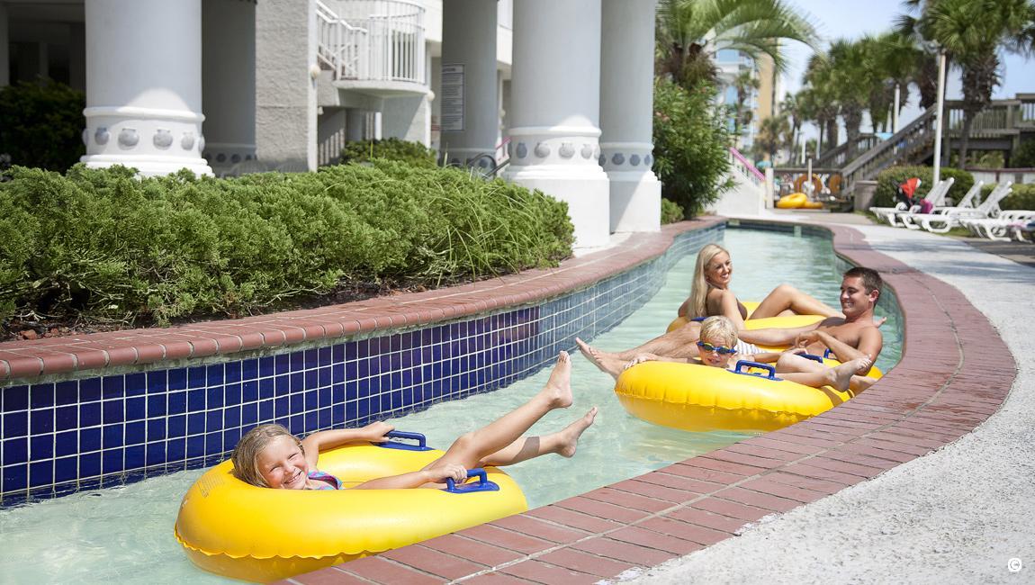 Family floating down the lazy river