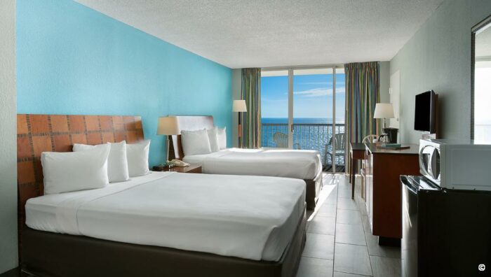 Oceanfront Room at Crown Reef with Queen Beds