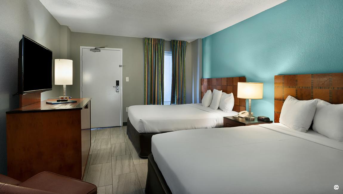 Oceanfront Suites in Myrtle Beach, Queen Suite Bedroom at Crown Reef
