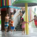 kids under the water umbrella at saltys splash house