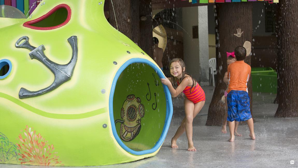 Girl playing at the waterpark